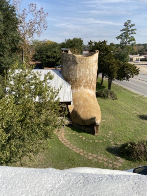 The boot from the Cowboy hat