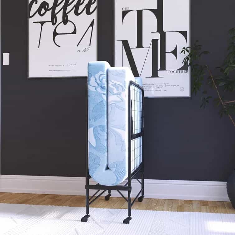 HOW TO BUY A FOLDING BED: TIPS TO CREATE AN AFFORDABLE GUEST SPACE 3 Folding bed folded up