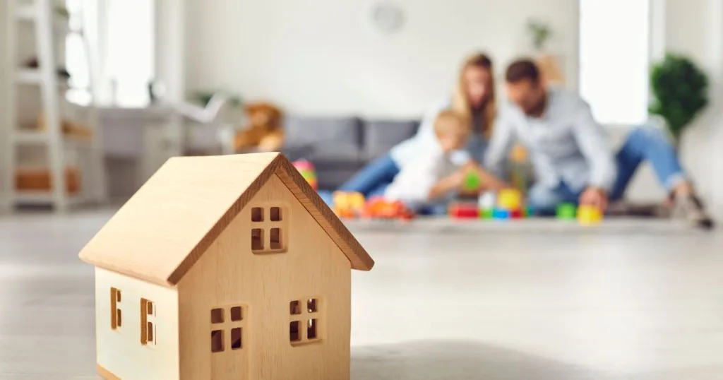 ADU VS TINY HOUSE: 12 KEY DIFFERENCES EXPLAINED 39 Happy family playing in new home