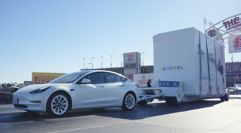 BOXABL: PREFAB AFFORDABLE HOUSING MADE EASY 5 Tesla-Model-3-tows-a-Boxabl-house