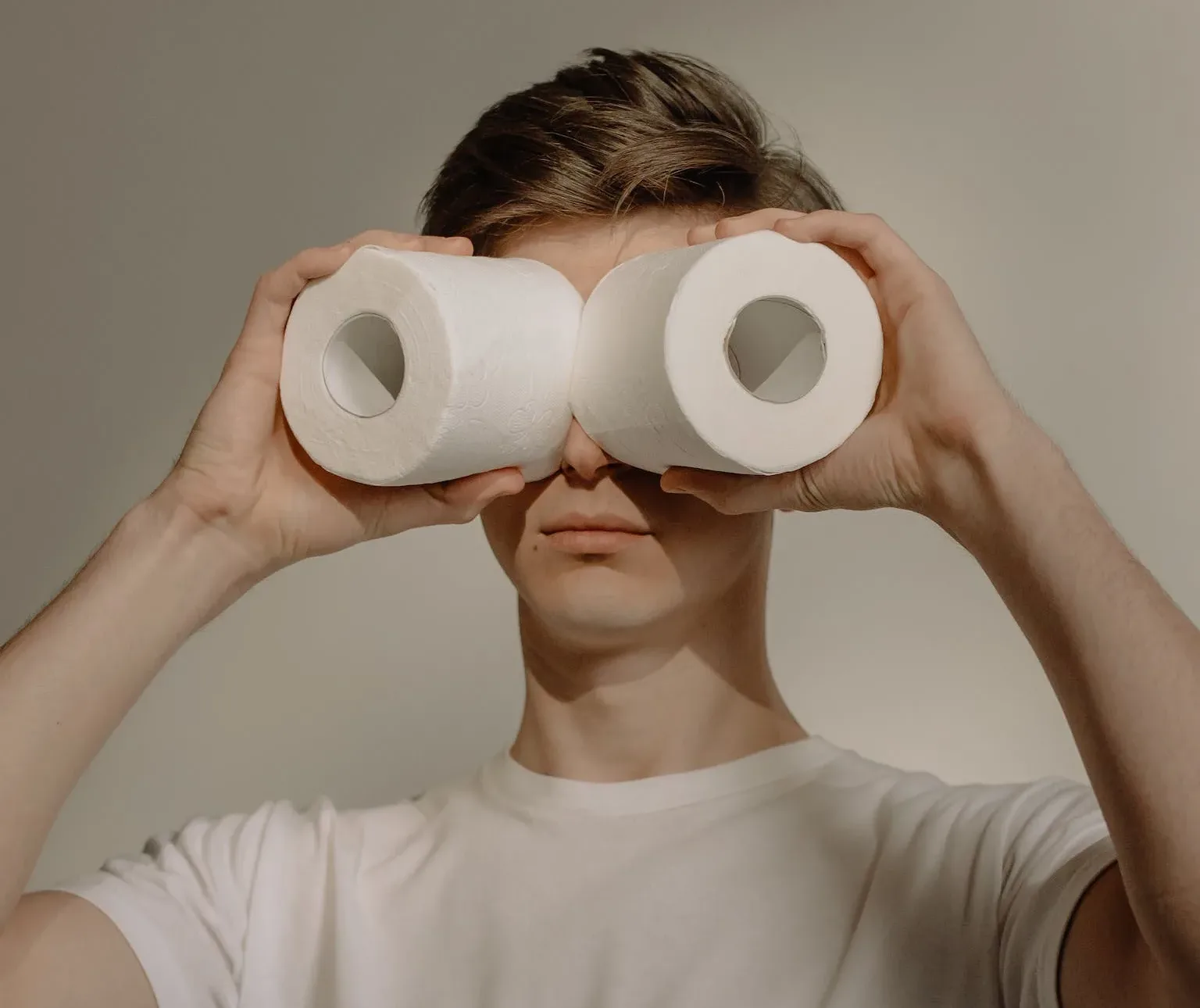 COMPOSTING TOILET CLEANING & MAINTENANCE: MAKE IT EASY AND NOT GROSS 4 Man in White Crew Neck Shirt Holding 2 White Tissue Rolls