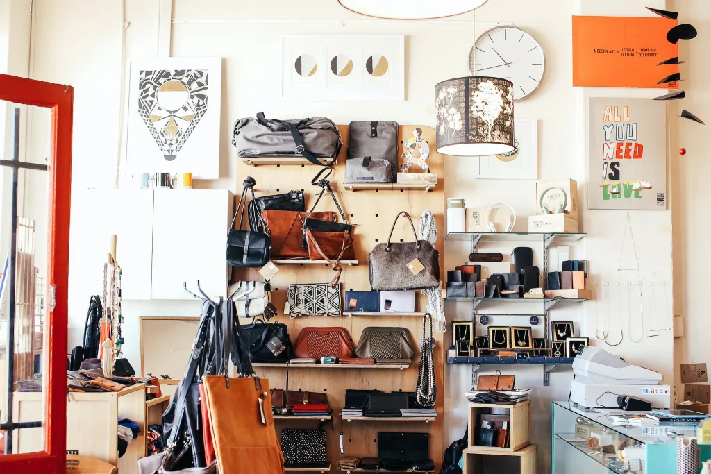 39 VALUABLE ADU IDEAS TO OPTIMIZE SPACE IN A BACKYARD BUILD (700+ PICS) 219 Assorted purses on shelves in shop