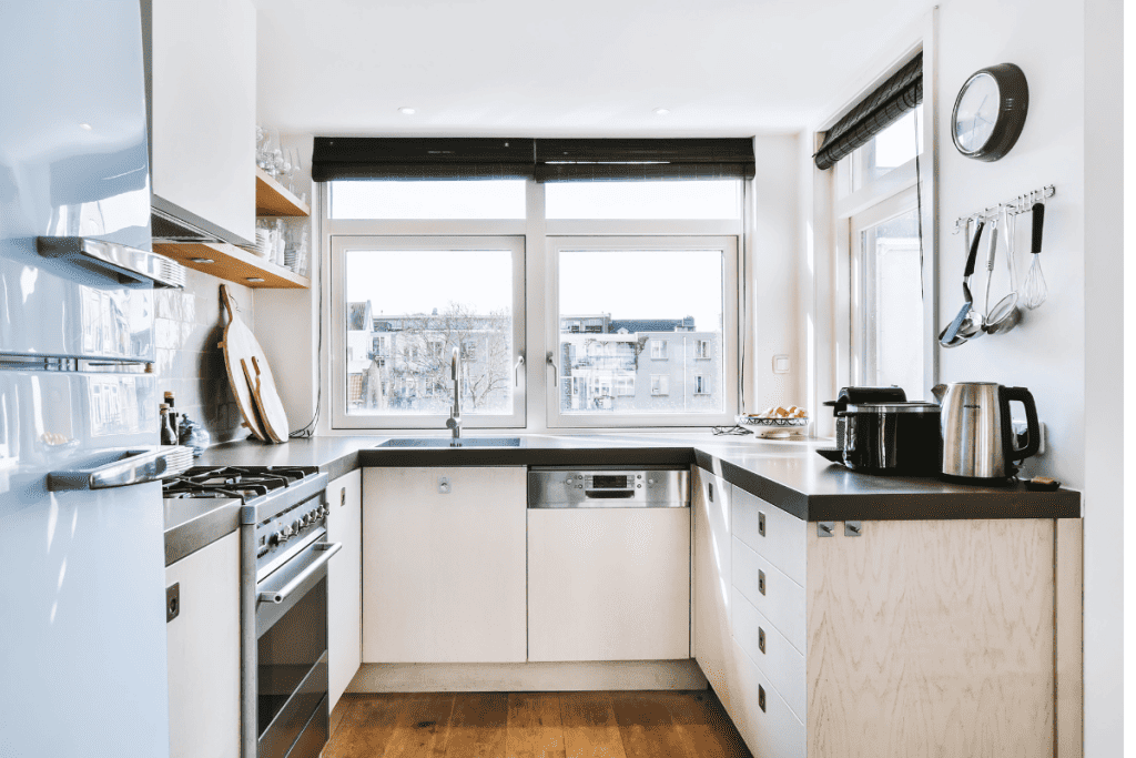 WHAT IS A TINY HOUSE? THE AFFORDABLE HOUSING OPTION EXPLAINED IN 2024 37 natural light in kitchen