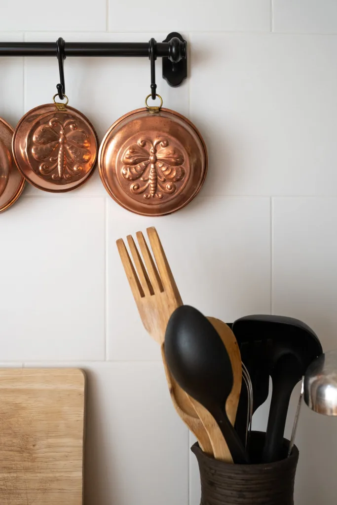 39 VALUABLE ADU IDEAS TO OPTIMIZE SPACE IN A BACKYARD BUILD (700+ PICS) 42 Old-Fashioned Copper Baking Pans Hanging on Wall in Kitchen