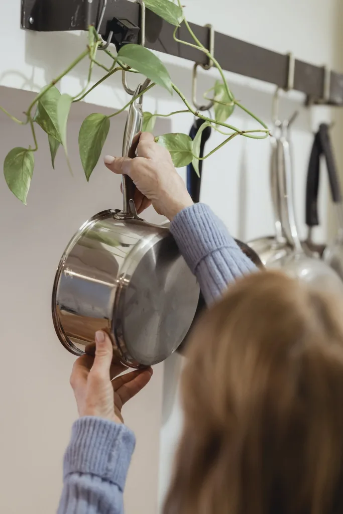 39 VALUABLE ADU IDEAS TO OPTIMIZE SPACE IN A BACKYARD BUILD (700+ PICS) 43 Person Hanging a Cooking Pot