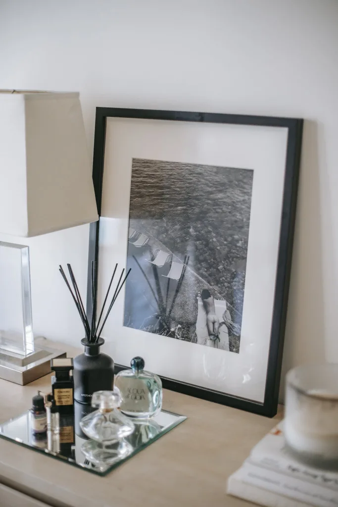 39 VALUABLE ADU IDEAS TO OPTIMIZE SPACE IN A BACKYARD BUILD (700+ PICS) 202 Photography in frame near perfume bottles and incense sticks with lamp near wall at home