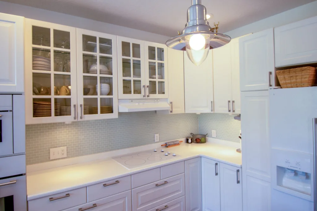 AN EFFICIENCY KITCHEN: DESIGN TIPS & IDEAS TO MAXIMIZE SPACE 17 White Wooden Cabinets in the Kitchen