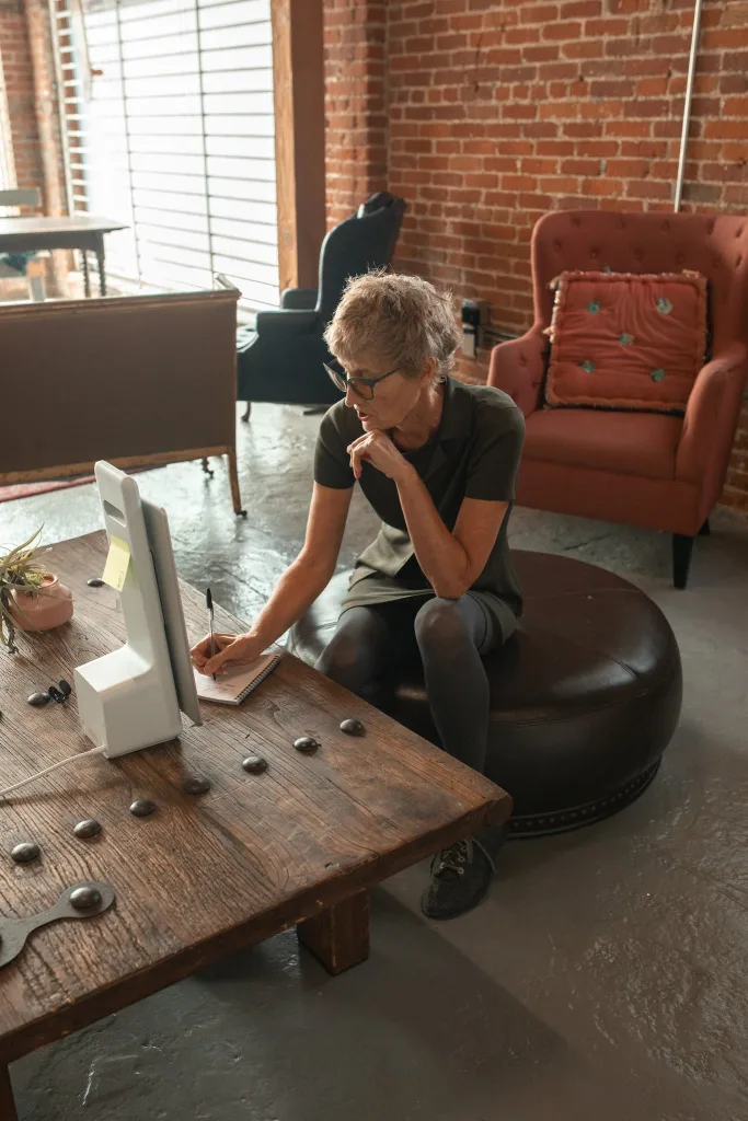 39 VALUABLE ADU IDEAS TO OPTIMIZE SPACE IN A BACKYARD BUILD (700+ PICS) 215 Woman in Green Dress Sitting on Leather Ottoman