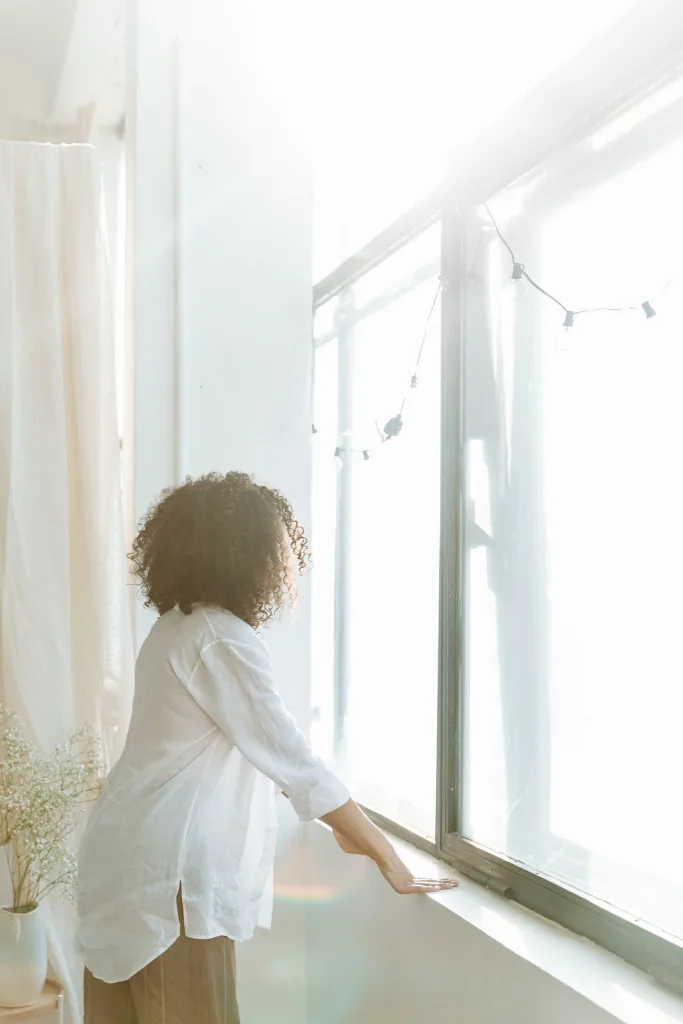 39 VALUABLE ADU IDEAS TO OPTIMIZE SPACE IN A BACKYARD BUILD (700+ PICS) 64 Woman Standing near Window