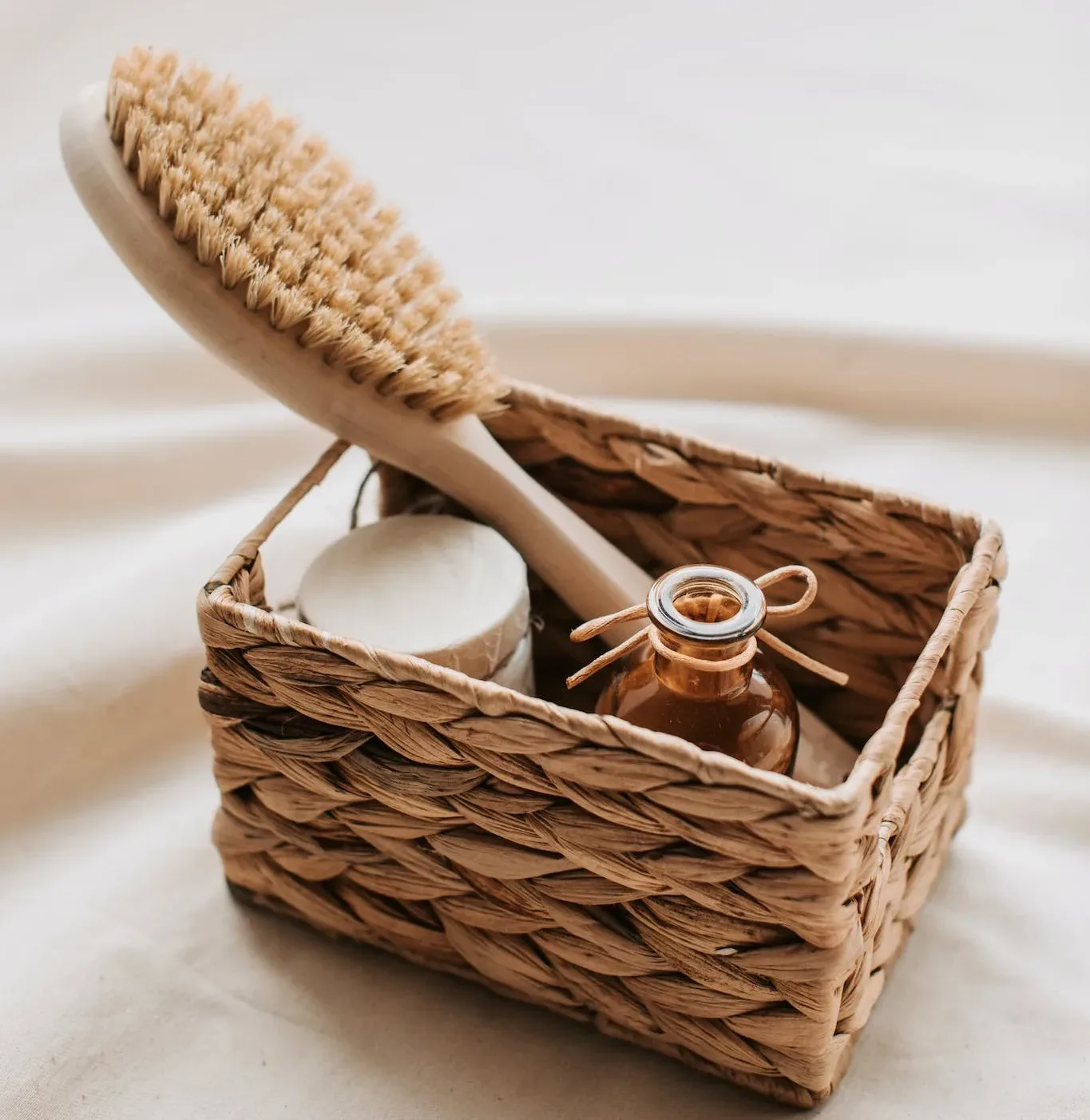 29 SMALL RUSTIC BATHROOM IDEAS ON A BUDGET YOU WILL LOVE 6 Woven Basket with Wooden Brush and Soap