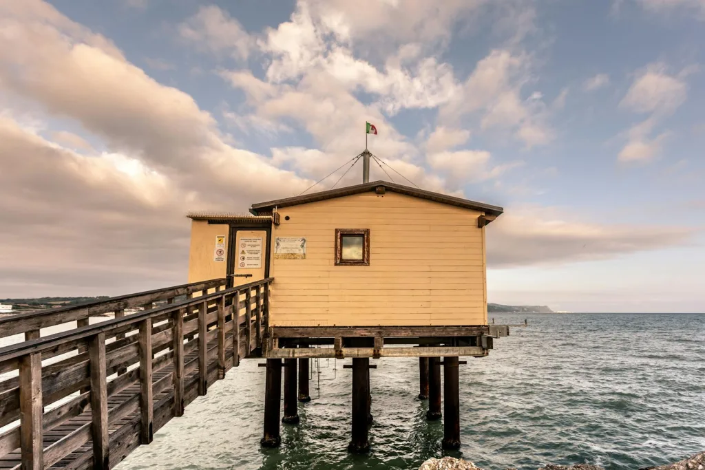 EXPLORING 4 TINY HOUSE FOUNDATION OPTIONS: WHAT YOU NEED TO KNOW 6 Close Up Photo of House