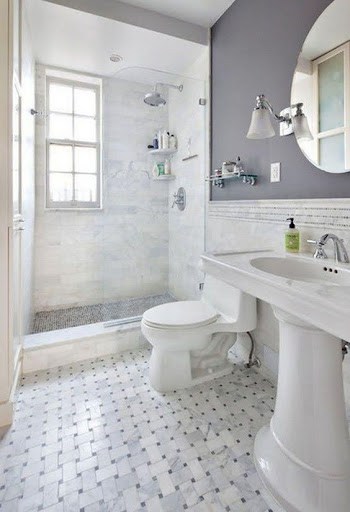 19 SMALL BATHROOM FLOOR TILE IDEAS: ADDING PERSONALITY TO A TINY HOUSE 15 The refined bathroom combines a subtle Basketweave Pattern floor with a classic pedestal sink and silver accents, creating a serene space with a touch of nostalgia