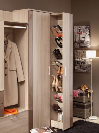 22 AWESOME SMALL WALK-IN CLOSET IDEAS FOR TINY HOMES & ADUS 21 A stylish closet corner with an open shoe organizer and a vintage travel case for a touch of old-school glam.