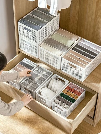 22 AWESOME SMALL WALK-IN CLOSET IDEAS FOR TINY HOMES & ADUS 17 A practical drawer organizer containing neatly sorted accessories in a wooden closet system.