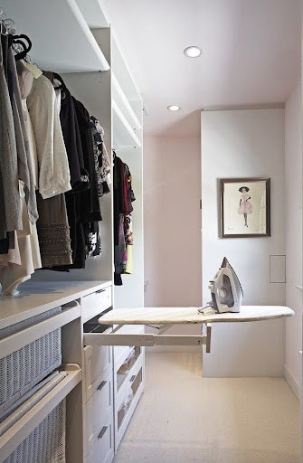 22 AWESOME SMALL WALK-IN CLOSET IDEAS FOR TINY HOMES & ADUS 20 A minimalist walk-in closet with a built-in ironing board for a quick touch-up on clothes.