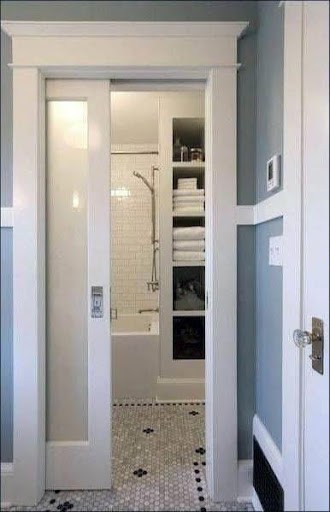 21 SMALL BATHROOM SHOWER IDEAS PERFECT FOR TINY HOUSES & ADUS 3 This slim Pocket Door or Sliding Door entrance reveals a snug shower space with pristine white subway wall tiles, accented by a black and white mosaic tile flooring that gives a classic touch to the compact bathroom.