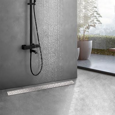 21 SMALL BATHROOM SHOWER IDEAS PERFECT FOR TINY HOUSES & ADUS 11 Contemporary small shower space with Linear Drain a matte black hand-held shower, linear drain, and a minimalistic approach.