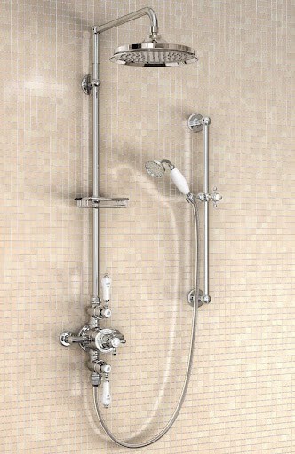 21 SMALL BATHROOM SHOWER IDEAS PERFECT FOR TINY HOUSES & ADUS 24 Sophisticated and refined bathroom shower featuring a Expose Plumbing Pipes, luxurious dual-function shower system, complemented by warm, amber-hued mosaic tiling for an opulent bathing experience.