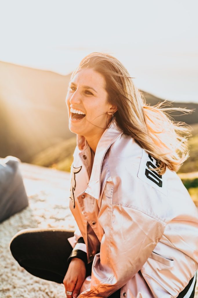 laughing woman while squatting