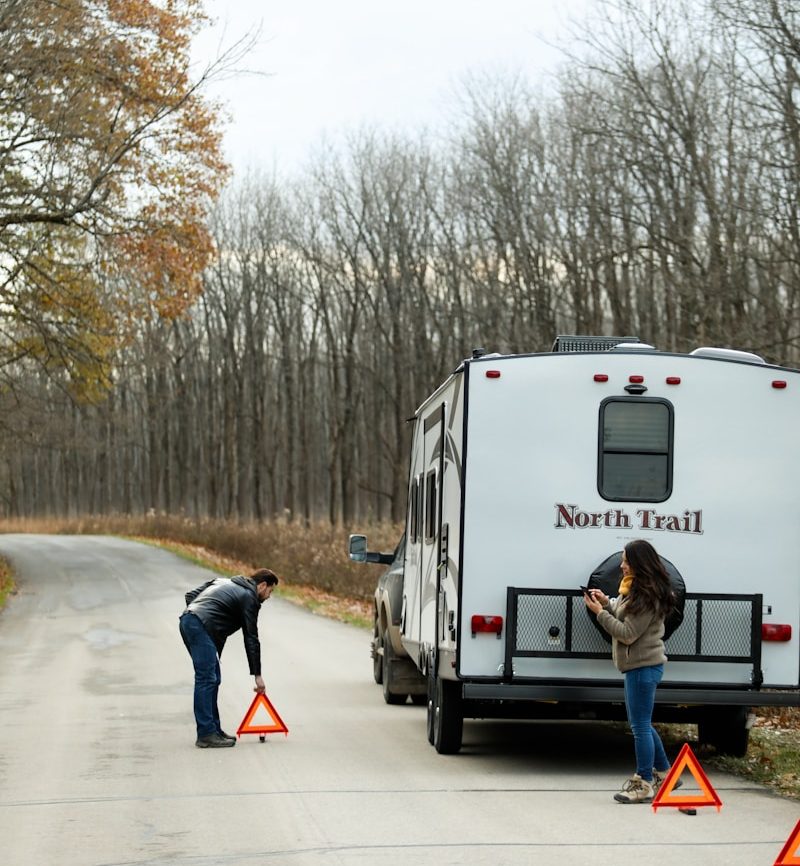 THE RISKY TRUTH: 17 DANGERS OF LIVING IN AN RV OR TINY HOUSE 13 white and red bus on road during daytime