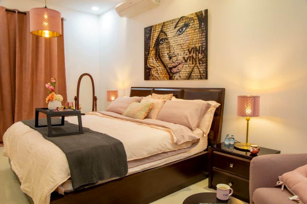 27 INSPIRING GARAGE CONVERSION IDEAS TO ADD LIVING SPACE TO YOUR HOME 7 white bed linen on bed