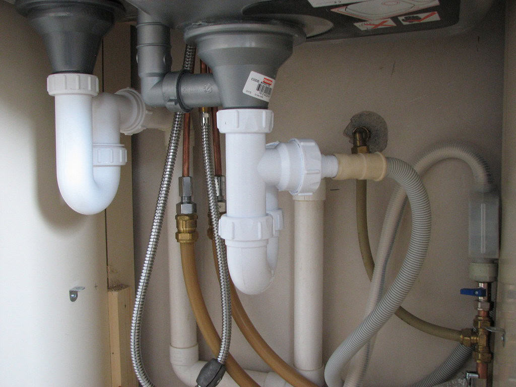 11 EASY TINY HOUSE PLUMBING MAINTENANCE TIPS THAT ANYONE CAN DO 2 under the sink, that's where they hide (IMG_6569)